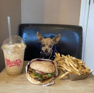 Burger, fries, and a shake 💚 at Monty's Good Burger in Riverside