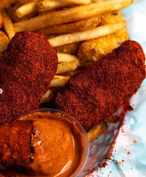 Looking for some spice? Order our chicken tenders Nashville hot!  at Monty's Good Burger in Riverside