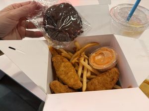 Chikkin tenders meal with fries, drink and double chocolate cookie   at Monty's Good Burger in Riverside