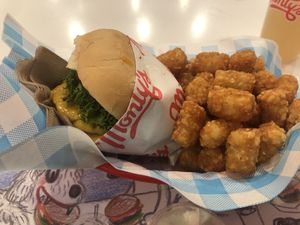 Double with cheese and Taters!!!! at Monty's Good Burger in Riverside