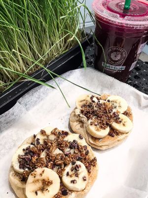 English muffin with banana, granola, peanut butter, cacao chips at Pure Juicery Bar in Cary