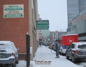 View from sidewalk at Affinity Vegetarian Garden in Winnipeg