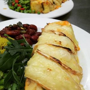 Frittata: Roast cauliflower, charred Med veg (courgette/red pepper/aubergine) with feta and Welsh cheddar in a free range egg bake. Topped with Brie at Domu in Bangor