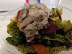 Salad with delish mushrooms on top. So good. I ate the whole thing. at Vegan Love in New York City