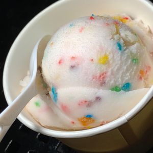 Fruity Pebbles Ice Cream: Cereal "Milk" Ice Cream w/ Fruity Pebbles (Medium = 2 Scoops). (Vegan) at Furniture City Creamery in Grand Rapids