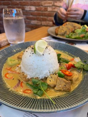 Tofu raisukaree (vegan gluten free) with vegan katsu curry in the background!  at Wagamama in Swindon