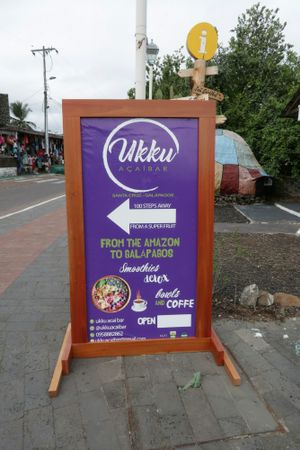 Sign in Charles Darwin Street at Ukku Acai Bar in Puerto Ayora