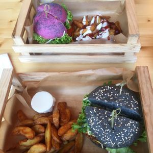 Flower burger with savory potatoes + flower mayo (really delicious!) and the cherry bomb burger with patatas bravas (spicey) at Flower Burger in Rotterdam