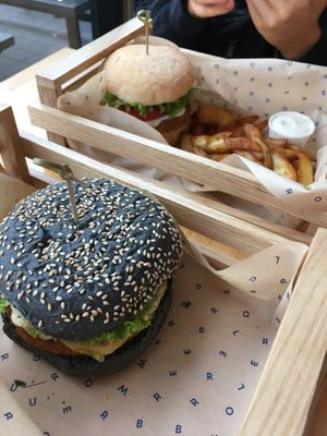 Cheesy chickpea burger and classic chickpea burger with seasoned potatoes  at Flower Burger in Rotterdam