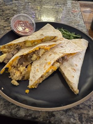 Veganized the quesadilla no sour cream   at Starving Artist Cafe in Norfolk