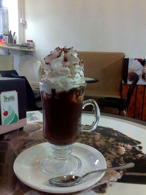 A hot Cioccolata with whipped cream, all Vegan. at Grande Italia in Rehovot