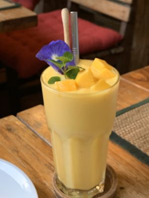 The best Mango Smoothie on the planet with reusable straw and stunning presentation! at All You Eat is Love in Chiang Mai