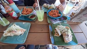 Vegan wrap with sweet potatoe fries. at King's Caffe in Malinska