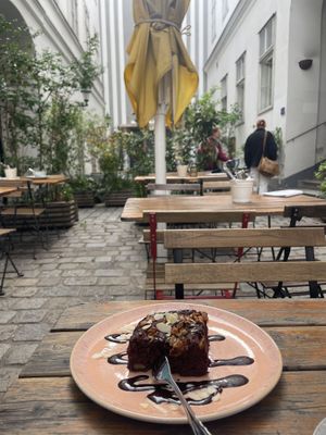 Brownie (vegan & gf) in the courtyard  at My Secret Garden Cafe in Vienna