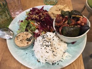 Hummus, rice, cooked vegetables, salad with homemade sauce. Delicious!! at My Secret Garden Cafe in Vienna