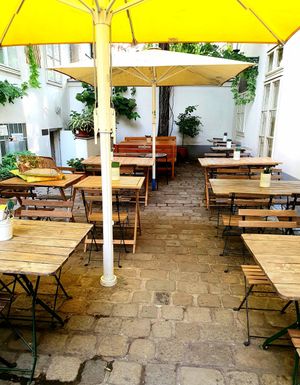 Seating in the backyard at My Secret Garden Cafe in Vienna