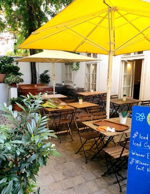 Seating in the backyard at My Secret Garden Cafe in Vienna