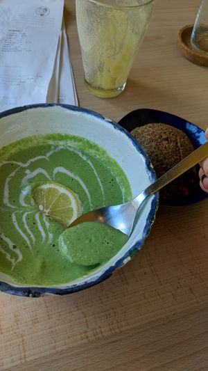 Spinach cream soup with oat/buckwheat bread at bistro ZDRAVO in Sarajevo