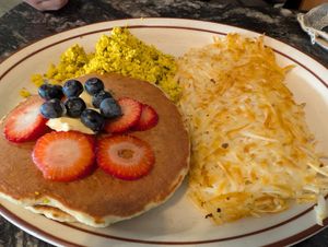 Pancake plate with hash brown and tofu scramble on the side. Also very delicious! at Borreguitas in Pomona
