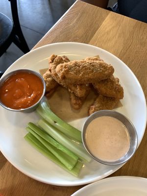 Chicken tenders with buffalo and chipotle ranch sauces  at Veggie Grill by Next Level in El Segundo