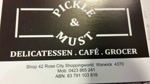 Business card at Pickle & Must Deli in Warwick