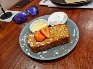 Banana bread with coconut cream and vegan butter at Perfect Break Vegetarian Cafe in Gerringong