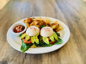 We haven't perfected a vegan hollandaise just yet. Stay tuned. YoEggs are poached soft. Do you miss a runny egg? at Coyote Grill in Laguna Beach