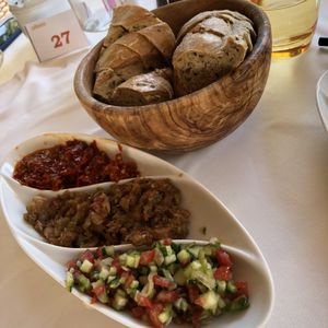 Home made harrissa in olive oil, aubergine dip and salad mix in olive oil and vinegar. 
 at Radisson Blu Udaipur Palace in Mezraya