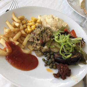 From the buffet restaurant lots of choice of veggies and salads, options change daily at Radisson Blu Udaipur Palace in Mezraya