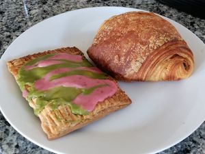 Strawberry matcha tart and pesto croissant at Happy Little Treats - High St in Columbus