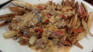 loaded fried with walnut topping at Urban Soul Grill in Cleveland