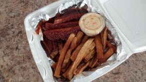 vegan ribs entree with coleslaw and fries, housemade seitan at Urban Soul Grill in Cleveland