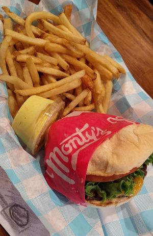 Fries with a side of burger at Monty's Good Burger - Koreatown in Los Angeles