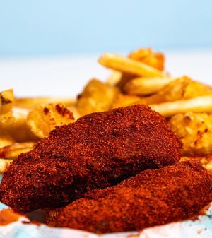 Want some heat? Grab some tenders Nashville hot style.  at Monty's Good Burger - Koreatown in Los Angeles