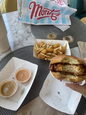 Nashville “hot” chikn and 50/50 fries/tots  at Monty's Good Burger - Koreatown in Los Angeles