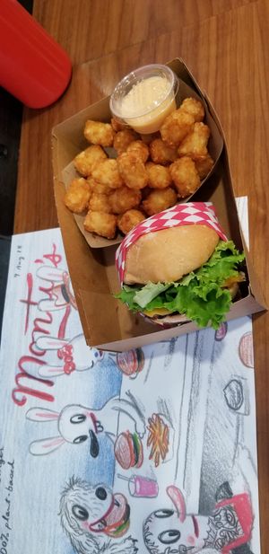 Burger & tots with spicy aioli at Monty's Good Burger - Koreatown in Los Angeles
