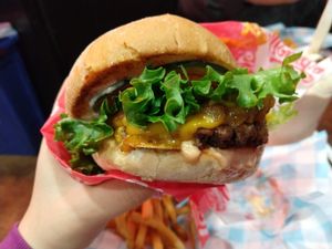Burger with single patty at Monty's Good Burger - Koreatown in Los Angeles
