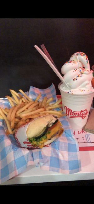 Vanilla milkshake with a single patty burger and fries! Yummy! at Monty's Good Burger - Koreatown in Los Angeles