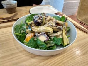 Warm salad ( sesame, tahine, pumpkin, sweet potato, aubernige, spinach) at Okaeri in Gijon