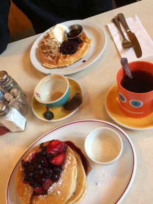 Blueberry and granola waffle / pancake and berries at The Breakfast Club in London