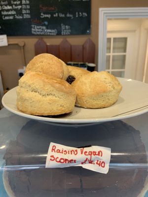 Scones served with coconut cream and jam.  at Cafe Aina in Stirling