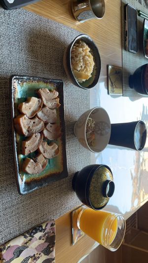Teriyaki wheat meat (seitan like), bamboo shoot rice, kombu mushroom soup with mountain vegetables, beansprout and sesame salad  at Vegan Minshuku Sanbiki Neko in Kyoto