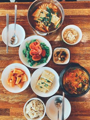 Food we ordered - tofu stew, ramen and the side dishes at Loving Hut in Seogwipo