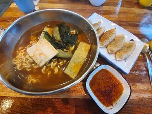 Spicy ramen and veg-dumplings at Loving Hut in Seogwipo
