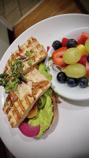 Avocado 🥑 toast /tofu and a side of fruit . to make this a vegan option ,just ask them not to use egg . And to sub tofu!   at Aroma Coffee & Tea in Studio City