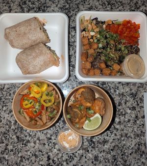 Burrito, Tiger with Soba Noodles, crispy dumplings at Fresh Kitchen & Juice Bar in Toronto