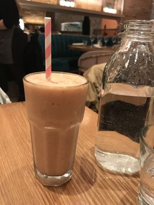 The Wizard smoothie with a paper straw at Fresh Kitchen & Juice Bar in Toronto