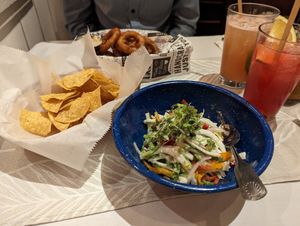 Coconut ceviche and onion rings at Elvi's Kitchen in San Pedro