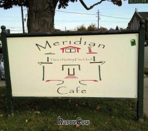 sign out front at Meridian Cafe in Louisville