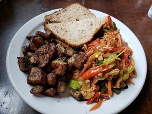 Tofu scramble, roasted potatoes, and #vegan buttered toast at The Cornerstone in Guelph
